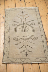 Distressed vintage Oushak rug with primitive charcoal patterns and tone-on-tone abrash.