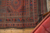 Original plainwoven kilim end of antique Belouch carpet, featuring tribal geometric motifs and fringe.