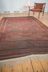 Original plainwoven kilim and ivory fringe of a hand-knotted Antique Belouch carpet.