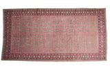Hand-knotted vintage distressed Khotan runner, pink and gray pomegranate motif, circa 1950s.