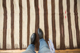 Vintage Turkish Kilim with alternating ivory and chocolate brown stripes and comb effect.