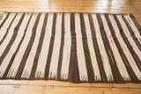 Delicate comb effect fringe with ivory and chocolate brown stripes, subtle red accents.