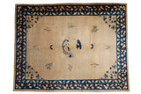 Antique Chinese Peking carpet, bird medallion on ivory field, cobalt blue bat border.