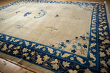 Antique Chinese Peking carpet border with unusual flying bat design in cobalt and navy blue.