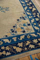Antique Chinese Peking carpet detail: unusual cobalt blue flying bat border on ivory field.
