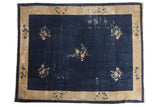 Vintage Peking carpet, dark indigo cobalt blue field with floral sprays, beige border.