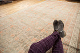 Antique distressed Khotan runner with softened platinum, silver, and terra cotta blush pomegranate design.