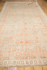 Antique Khotan runner with even wear, platinum, silver, terra cotta blush pomegranate motif.