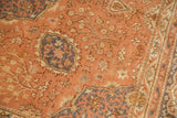Vintage distressed Kaisery carpet's plush pile: dusty rose field, slate grey floral patterns.
