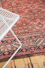 Stylized Mir Serbend border and muted red Herati pattern on a vintage Karabagh carpet.