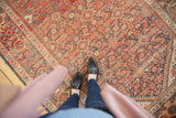 Vintage Hamadan carpet with faded terracotta and slate blue Herati pattern, abrashes.