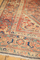 Vintage Hamadan carpet corner, Herati motif field, terracotta and royal blue turtle border, even wear.