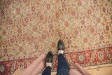 Vintage Kaisary carpet field with oversized Herati motif; pale seafoam and cherry red border.