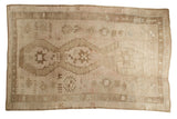 Vintage Distressed Oushak carpet, triple center medallions, weaver inscriptions, soft beige, coffee, blush tones.