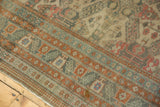 Geometric borders in terra cotta and celadon, with worn pile and faint foundation on Kayseri carpet.