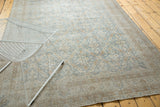 Distressed vintage Oushak carpet, allover floral lattice in slate blue, sand, and antique ivory.