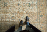 Worn pile on distressed Turkish Sparta carpet with ivory and denim blue floral palmettes.