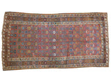 Antique Northwest Persian rug, germinating plant lattice, raspberry red, sky blue, gold, green.