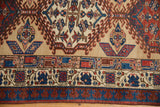 Wide Laleh Abbasi border in sapphire blue and ivory on an antique Serab rug runner.