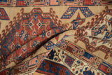 Hand-knotted texture of an antique Serab rug showing even wear and visible knot heads.