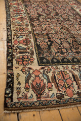 Wide antique ivory border with large terra cotta palmettes on a vintage Kurdish Bijar rug.