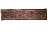Hand knotted vintage Malayer runner rug, allover germinating flower motif, madder red, navy blue, chocolate brown.