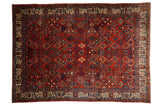 Vintage Joshegan carpet, textured allover garden lattice design in black cherry red and sapphire blue.