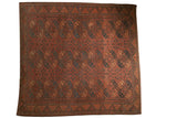 Vintage Afghani Ersari square carpet, chestnut field, navy floral medallions, zigzag border.