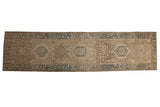 Distressed vintage Karaja runner with geometric medallions, dusty blue, antique ivory, and even wear.