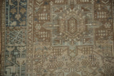 Distressed geometric pattern with dusty blue and antique ivory tones on Karaja rug.