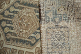 Distressed vintage Karaja runner's pile with even wear and hand-knotted reverse.