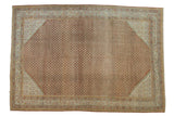 Vintage distressed Sivas carpet, burnt orange field with powder blue Mir Serbend boteh pattern.