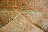 Distressed Sivas carpet corner, showing burnt orange Mir Serbend botehs and hand-knotted back.