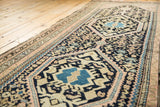 Persian Hamadan runner, intricate navy, blush, and aqua geometric medallion with worn side border.