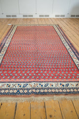 Secure original macrame fringe and a vibrant patterned border of the vintage Kurdish carpet.