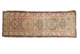 Antique Moghan Kazak runner, geometric gul medallions in brick red, sky blue, and ivory, 3'4