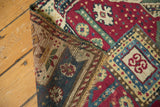 Antique Kurdish runner's secured edge, showing hand knotted foundation and geometric pile.