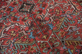 Low pile of Vintage Mehrivan carpet, with cherry red field, blue, gold serrated leaves.