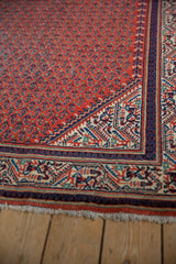 Secured ivory fringe and classic multi-color border of vintage Mir Sarouk rug with even pile wear.