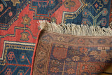 Vintage Kurdish Bijar rug's hand-knotted pile and detailed back weave with fringe.