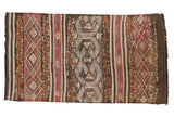 Vintage Jijim runner featuring banded geometric patterns in dark brown, raspberry, ivory, and gold.