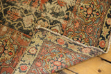 Worn vintage Malayer rug pile, showing foundation, delicate vinery, madder root red patterns.