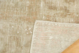 Vintage distressed Oushak rug pile with subtle earthen tones, revealing hand-knotted reverse.