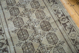 Distressed Oushak runner with geometric guls and wide banded border in charcoal and ivory.