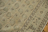 Distressed vintage Oushak carpet with mostly even wear, pale seafoam green boteh motifs on ivory.