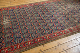 Malayer runner's germinating flower boteh design, red border, and low pile with foundation.