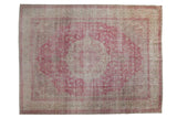 Vintage distressed Sivas carpet, faded fuchsia medallion, scrolling vinery, visible wear, 8x10.5.