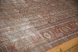 Vintage distressed Mahal carpet, showing exposed foundation and Herati pattern detail.