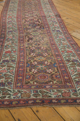 Secured fringe and faded raspberry geometric border of a collectible Antique Kurdish runner.