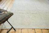 Evenly worn pile with subtle ivory, platinum, and pale blue floral motifs of the Sivas carpet.